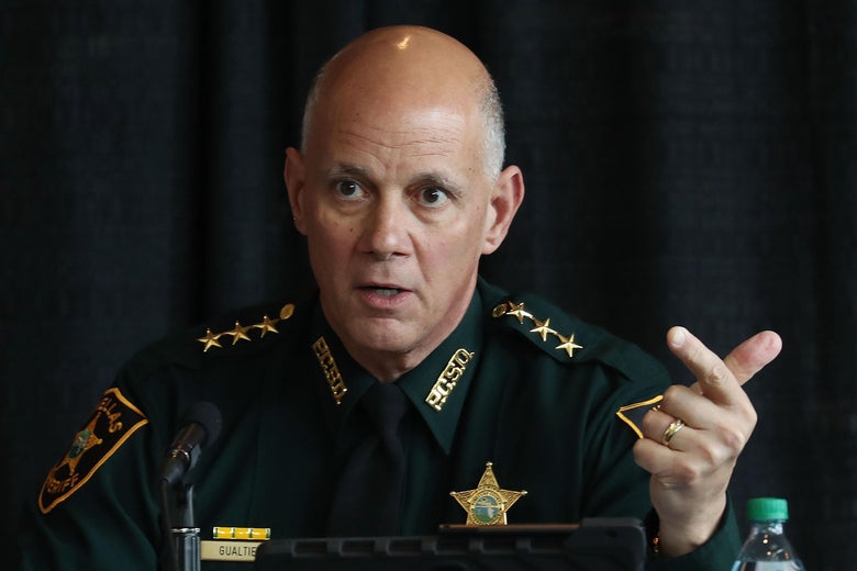 Pinellas County Sheriff Bob Gualtieri speaks in front of a microphone.